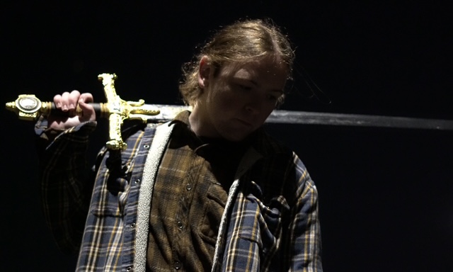 Dramatic portrait with a sword prop